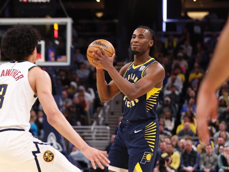 INDIANAPOLIS, IN - FEBRUARY 24: Aaron Nesmith #23 of the Indiana Pacers looks to pass the ball during the game against the Denver Nuggets on February 24, 2025 at Gainbridge Fieldhouse in Indianapolis, Indiana. NOTE TO USER: User expressly acknowledges and agrees that, by downloading and or using this Photograph, user is consenting to the terms and conditions of the Getty Images License Agreement. Mandatory Copyright Notice: Copyright 2025 NBAE (Photo by Pepper Robinson/NBAE via Getty Images)