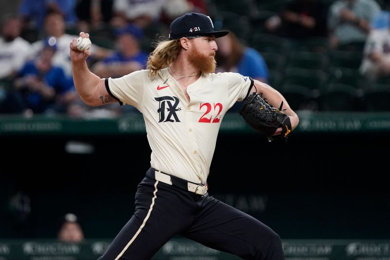 Jul 19, 2024; Arlington, Texas, USA; Texas Rangers pitcher Jon Gray (22) throws to the plate during the ninth inning against the Baltimore Orioles at Globe Life Field. Mandatory Credit: Raymond Carlin III-USA TODAY Sports