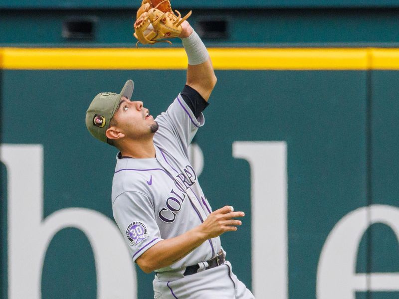 May 21, 2023; Arlington, Texas, USA; Colorado Rockies shortstop Ezequiel Tovar (14) catches a fly ball during the seventh inning against the Texas Rangers at Globe Life Field. Mandatory Credit: Andrew Dieb-USA TODAY Sports