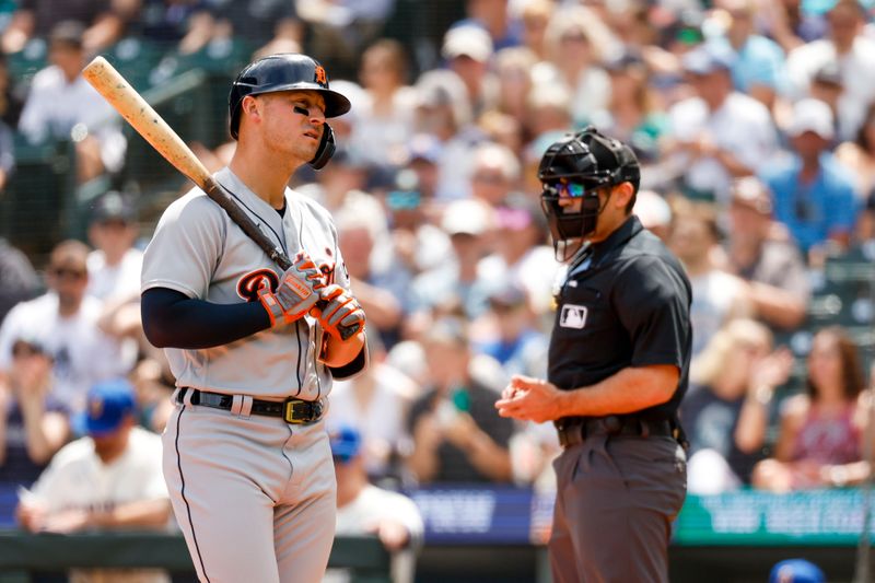 Jul 16, 2023; Seattle, Washington, USA; Detroit Tigers first baseman Spencer Torkelson (20) reacts after striking out against the Seattle Mariners during the first inning at T-Mobile Park. Mandatory Credit: Joe Nicholson-USA TODAY Sports