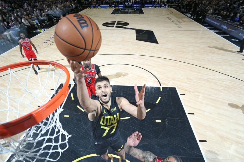 SALT LAKE CITY, UT - MARCH 6: Omer Yurtseven #77 of the Utah Jazz shoots the ball during the game against the Chicago Bulls on March 6, 2024 at Delta Center in Salt Lake City, Utah. NOTE TO USER: User expressly acknowledges and agrees that, by downloading and or using this Photograph, User is consenting to the terms and conditions of the Getty Images License Agreement. Mandatory Copyright Notice: Copyright 2024 NBAE (Photo by Melissa Majchrzak/NBAE via Getty Images)