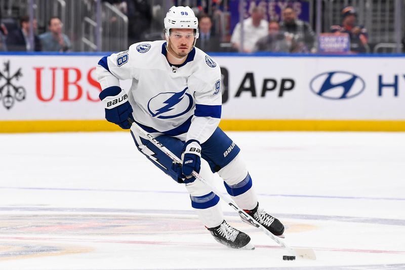 Apr 6, 2023; Elmont, New York, USA; Tampa Bay Lightning defenseman Mikhail Sergachev (98) skates across center ice against the New York Islanders during the first period at UBS Arena. Mandatory Credit: Dennis Schneidler-USA TODAY Sports