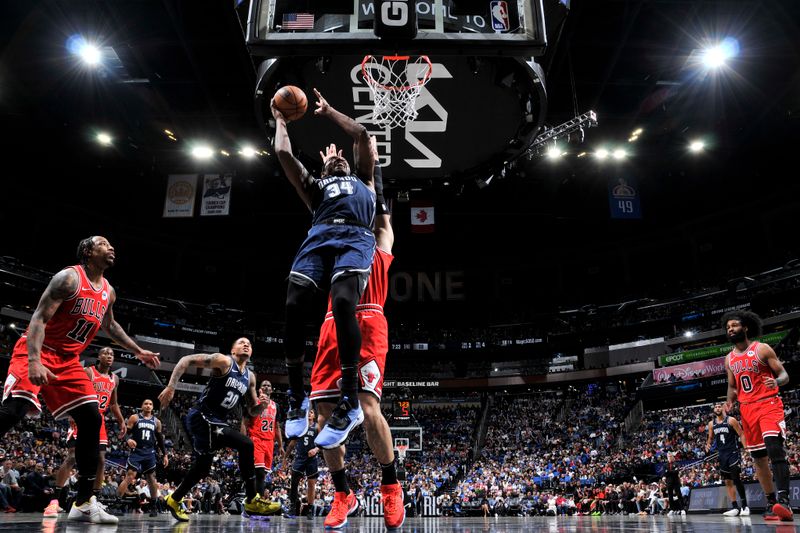 ORLANDO, FL - APRIL 7: Wendell Carter Jr. #34 of the Orlando Magic drives to the basket during the game against the Chicago Bulls on April 7, 2024 at the Kia Center in Orlando, Florida. NOTE TO USER: User expressly acknowledges and agrees that, by downloading and or using this photograph, User is consenting to the terms and conditions of the Getty Images License Agreement. Mandatory Copyright Notice: Copyright 2024 NBAE (Photo by Fernando Medina/NBAE via Getty Images)