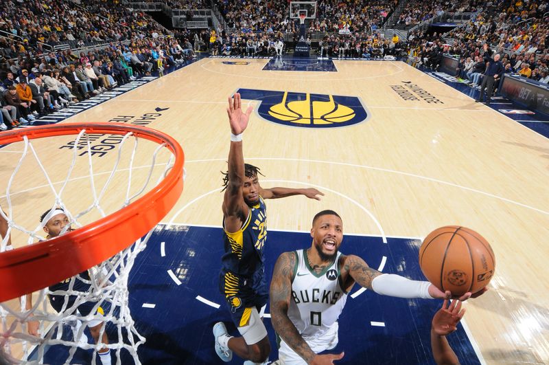 INDIANAPOLIS, IN - JANUARY 3: Damian Lillard #0 of the Milwaukee Bucks drives to the basket during the game against the Indiana Pacers on January 3, 2024 at Gainbridge Fieldhouse in Indianapolis, Indiana. NOTE TO USER: User expressly acknowledges and agrees that, by downloading and or using this Photograph, user is consenting to the terms and conditions of the Getty Images License Agreement. Mandatory Copyright Notice: Copyright 2024 NBAE (Photo by Ron Hoskins/NBAE via Getty Images)