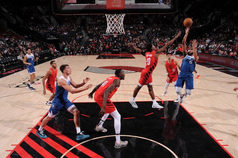 PORTLAND, OR - FEBRUARY 13:  Jordan McLaughlin #6 of the Minnesota Timberwolves goes to the basket during the game on February 13, 2024 at the Moda Center Arena in Portland, Oregon. NOTE TO USER: User expressly acknowledges and agrees that, by downloading and or using this photograph, user is consenting to the terms and conditions of the Getty Images License Agreement. Mandatory Copyright Notice: Copyright 2024 NBAE (Photo by Cameron Browne/NBAE via Getty Images)