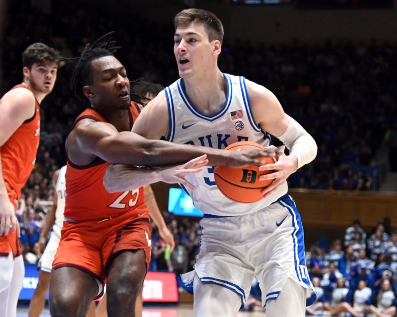 Feb 25, 2023; Durham, North Carolina, USA;  Duke Blue Devils center Kyle Filipowski(30) drives to the basket as Virginia Tech Hokies forward Justyn Mutts (25) defends during the second half at Cameron Indoor Stadium. The Blue Devils won 81-65. Mandatory Credit: Rob Kinnan-USA TODAY Sports