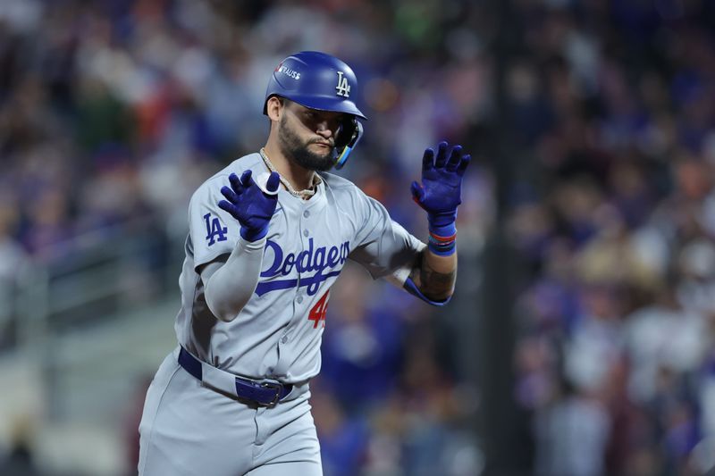 Oct 18, 2024; New York City, New York, USA; Los Angeles Dodgers outfielder Andy Pages (44) celebrates a solo home run in the fourth inning against the New York Mets  during game five of the NLCS for the 2024 MLB playoffs at Citi Field. Mandatory Credit: Brad Penner-Imagn Images