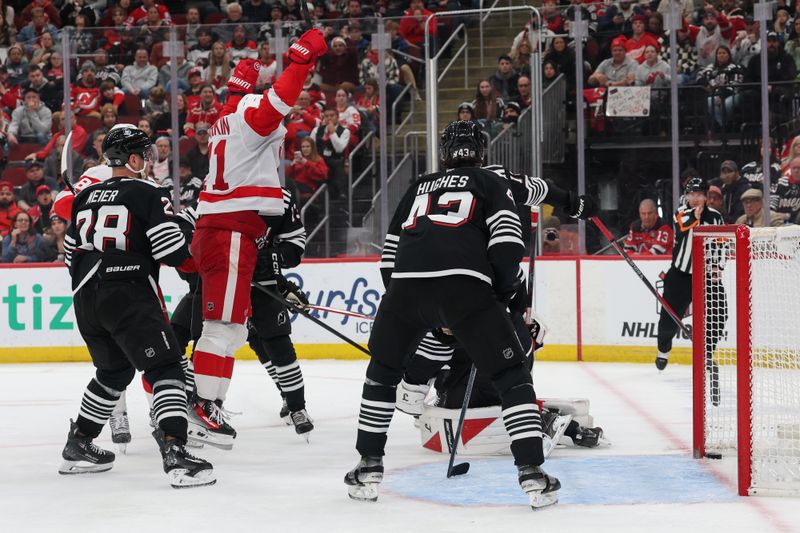 Nov 24, 2025; Newark, New Jersey, USA; Detroit Red Wings center Dylan Larkin (71) celebrates scoring a goal against the New Jersey Devils during the third period at Prudential Center. Mandatory Credit: Ed Mulholland-Imagn Images