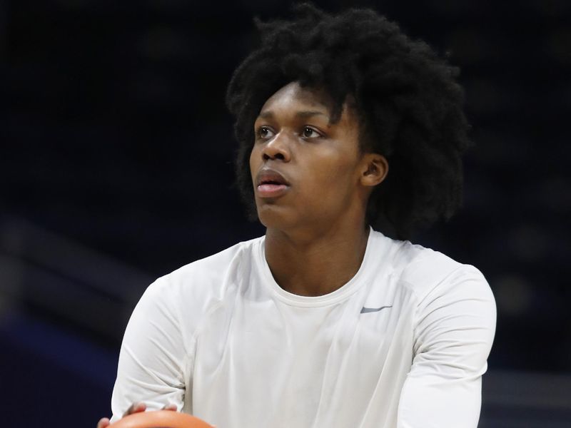 Dec 9, 2023; Pittsburgh, Pennsylvania, USA;  Pittsburgh Panthers guard Carlton Carrington (7) warms up before the game against the Canisius Golden Griffins at the Petersen Events Center. Mandatory Credit: Charles LeClaire-USA TODAY Sports