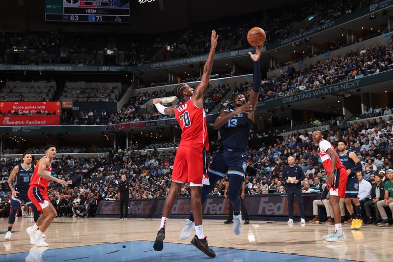 MEMPHIS, TN - NOVEMBER 8: Jaren Jackson Jr. #13 of the Memphis Grizzlies shoots the ball during the game against the Washington Wizards on November 8, 2024 at FedExForum in Memphis, Tennessee. NOTE TO USER: User expressly acknowledges and agrees that, by downloading and or using this photograph, User is consenting to the terms and conditions of the Getty Images License Agreement. Mandatory Copyright Notice: Copyright 2024 NBAE (Photo by Joe Murphy/NBAE via Getty Images)