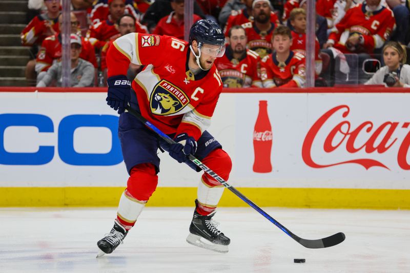 May 26, 2024; Sunrise, Florida, USA; Florida Panthers center Aleksander Barkov (16) moves the puck against the New York Rangers during the third period in game three of the Eastern Conference Final of the 2024 Stanley Cup Playoffs at Amerant Bank Arena. Mandatory Credit: Sam Navarro-USA TODAY Sports