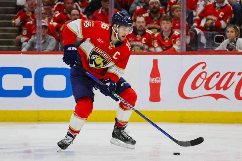 May 26, 2024; Sunrise, Florida, USA; Florida Panthers center Aleksander Barkov (16) moves the puck against the New York Rangers during the third period in game three of the Eastern Conference Final of the 2024 Stanley Cup Playoffs at Amerant Bank Arena. Mandatory Credit: Sam Navarro-USA TODAY Sports