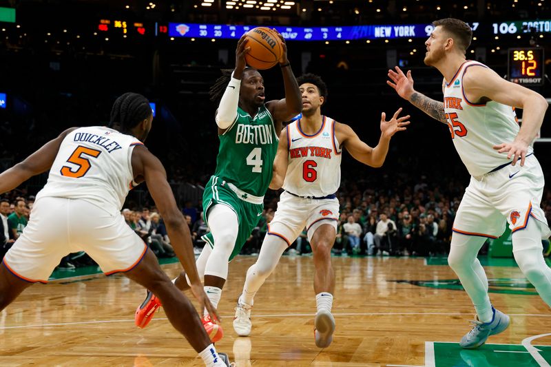 BOSTON, MA - DECEMBER 8: Jrue Holiday #4 of the Boston Celtics goes past Quentin Grimes #6 of the New York Knicks during the second half at TD Garden on December 8, 2023 in Boston, Massachusetts. NOTE TO USER: User expressly acknowledges and agrees that, by downloading and/or using this Photograph, user is consenting to the terms and conditions of the Getty Images License Agreement. (Photo By Winslow Townson/Getty Images)