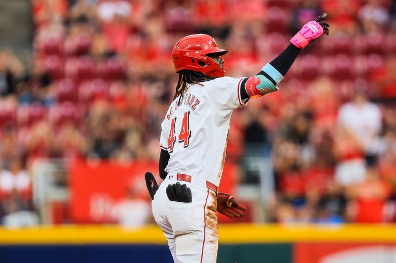 Aug 12, 2024; Cincinnati, Ohio, USA; Cincinnati Reds shortstop Elly De La Cruz (44) reacts after hitting a double in the fifth inning against the St. Louis Cardinals at Great American Ball Park. Mandatory Credit: Katie Stratman-USA TODAY Sports