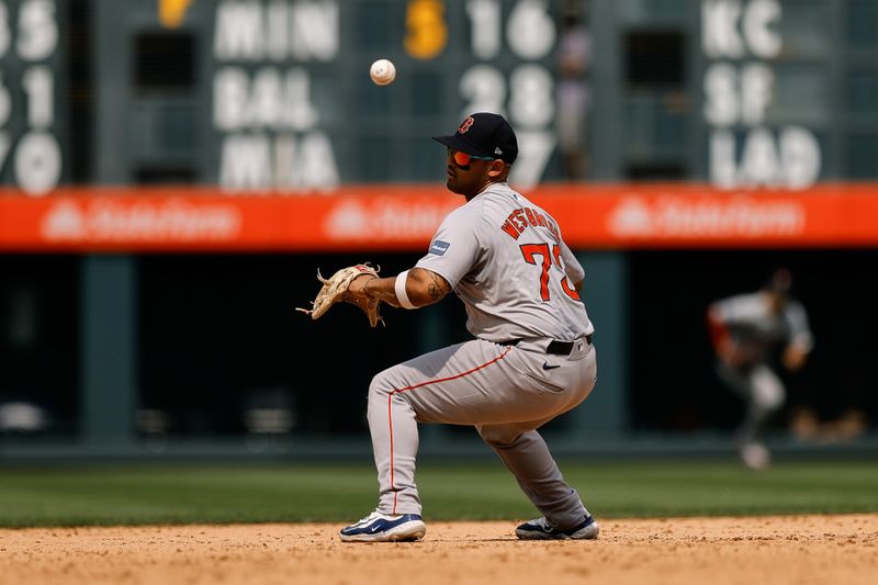 Jul 24, 2024; Denver, Colorado, USA; Boston Red Sox shortstop David Hamilton (70) is unable to field a throw to second in the sixth inning against the Colorado Rockies at Coors Field. Mandatory Credit: Isaiah J. Downing-USA TODAY Sports