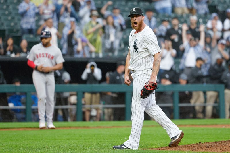 Jun 8, 2024; Chicago, Illinois, USA; Chicago White Sox relief pitcher Michael Kopech (34) reacts after striking out Boston Red Sox outfielder Jarren Duran for a final out during the ninth inning at Guaranteed Rate Field. Mandatory Credit: Kamil Krzaczynski-USA TODAY Sports