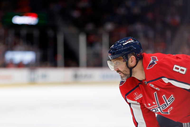 Feb 13, 2024; Washington, District of Columbia, USA; Washington Capitals left wing Alex Ovechkin (8) lines up for a face-off against the Colorado Avalanche in the third period at Capital One Arena. Mandatory Credit: Geoff Burke-USA TODAY Sports