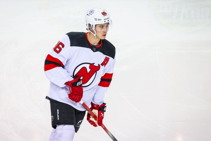 Dec 9, 2023; Calgary, Alberta, CAN; New Jersey Devils center Jack Hughes (86) skates during the warmup period against the Calgary Flames at Scotiabank Saddledome. Mandatory Credit: Sergei Belski-USA TODAY Sports