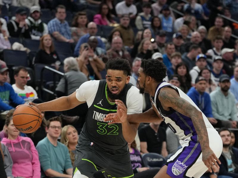 MINNEAPOLIS, MN -  MARCH 1: Karl-Anthony Towns #32 of the Minnesota Timberwolves handles the ball during the game against the Sacramento Kings on March 1, 2024 at Target Center in Minneapolis, Minnesota. NOTE TO USER: User expressly acknowledges and agrees that, by downloading and or using this Photograph, user is consenting to the terms and conditions of the Getty Images License Agreement. Mandatory Copyright Notice: Copyright 2024 NBAE (Photo by Jordan Johnson/NBAE via Getty Images)