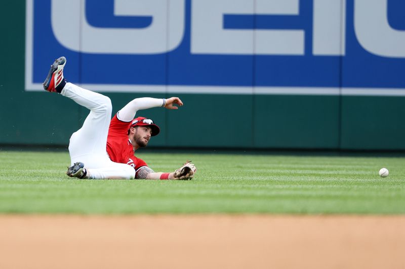 Apr 6, 2025; Washington, District of Columbia, USA; Washington Nationals outfielder Dylan Crews (3) drops the ball during the fifth inning against the Arizona Diamondbacks at Nationals Park. Mandatory Credit: Daniel Kucin Jr.-Imagn Images