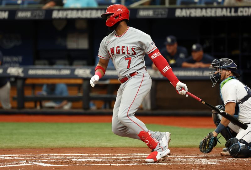 Sep 21, 2023; St. Petersburg, Florida, USA; Los Angeles Angels right fielder Jo Adell (7) singles against the Tampa Bay Rays during the second inning at Tropicana Field. Mandatory Credit: Kim Klement Neitzel-USA TODAY Sports