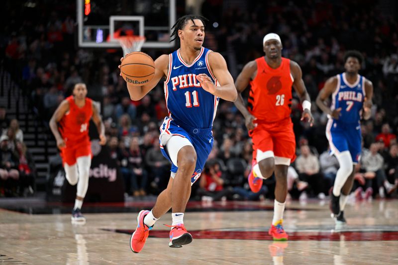 PORTLAND, OREGON - JANUARY 29: Jaden Springer #11 of the Philadelphia 76ers drives the ball up court during the fourth quarter against the Portland Trail Blazers at the Moda Center on January 29, 2024 in Portland, Oregon. The Portland Trail Blazers won 130-104. NOTE TO USER: User expressly acknowledges and agrees that, by downloading and or using this photograph, User is consenting to the terms and conditions of the Getty Images License Agreement. (Photo by Alika Jenner/Getty Images)