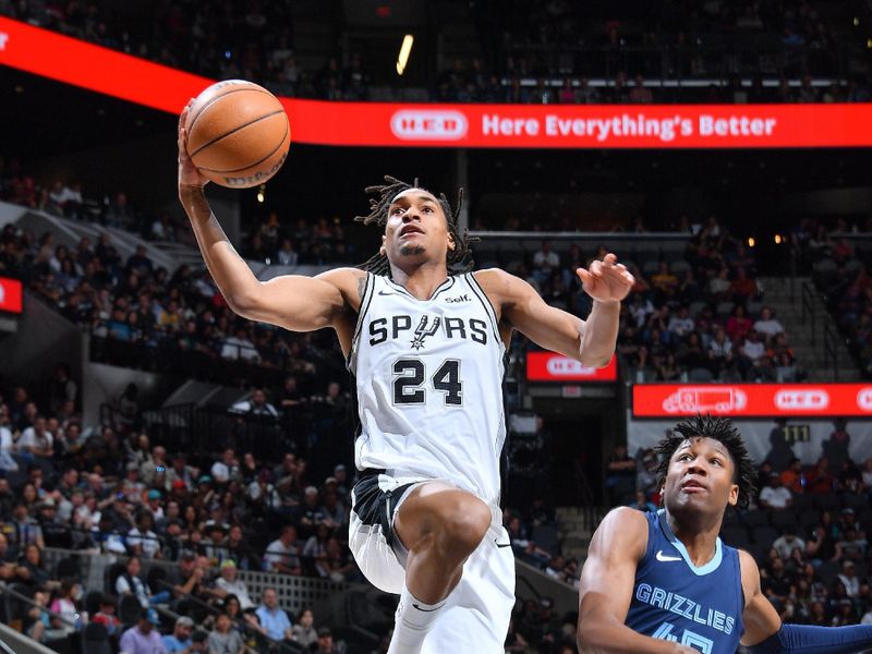 SAN ANTONIO, TX - MARCH 22  Devin Vassell #24 of the San Antonio Spurs drives to the basket during the game against the Memphis Grizzlies on March 22, 2024 at the Frost Bank Center in San Antonio, Texas. NOTE TO USER: User expressly acknowledges and agrees that, by downloading and or using this photograph, user is consenting to the terms and conditions of the Getty Images License Agreement. Mandatory Copyright Notice: Copyright 2024 NBAE (Photos by Michael Gonzales/NBAE via Getty Images)