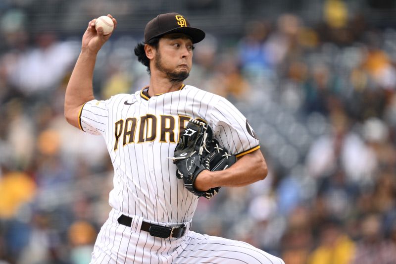 May 17, 2023; San Diego, California, USA; San Diego Padres starting pitcher Yu Darvish (11) throws a pitch against the Kansas City Royals during the first inning at Petco Park. Mandatory Credit: Orlando Ramirez-USA TODAY Sports