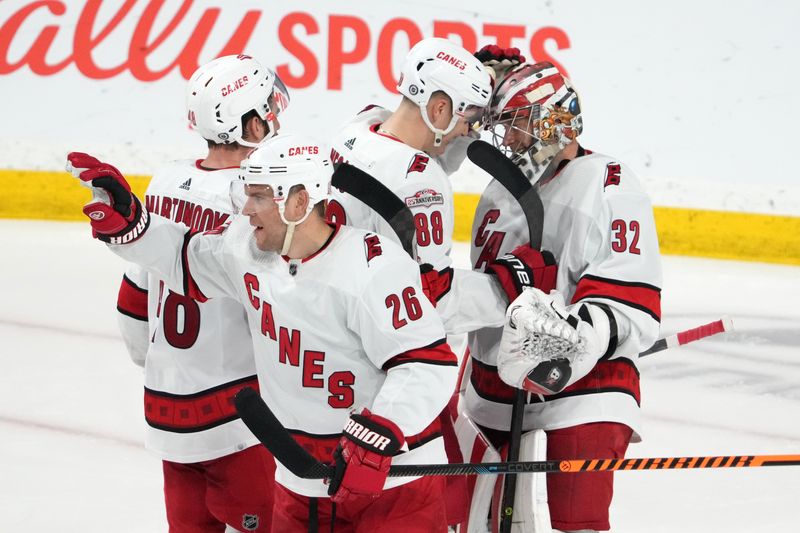 Mar 3, 2023; Tempe, Arizona, USA; Carolina Hurricanes players celebrate after defeating the Arizona Coyotes at Mullett Arena. Mandatory Credit: Joe Camporeale-USA TODAY Sports