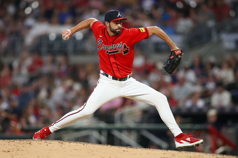 Sep 8, 2023; Atlanta, Georgia, USA; Atlanta Braves relief pitcher Ben Heller (71) throws against the Pittsburgh Pirates in the ninth inning at Truist Park. Mandatory Credit: Brett Davis-USA TODAY Sports