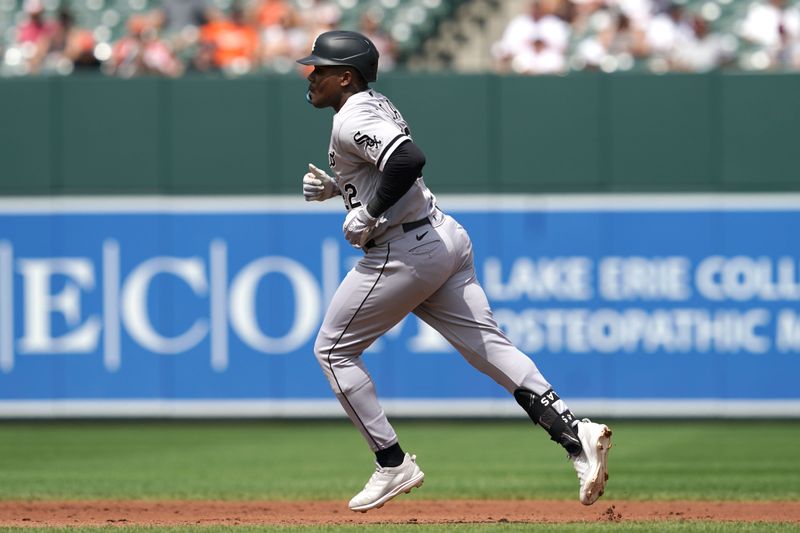 Aug 30, 2023; Baltimore, Maryland, USA; Chicago White Sox outfielder Oscar Colas (22) rounds the bases following his solo run home run in the second inning against the Baltimore Orioles at Oriole Park at Camden Yards. Mandatory Credit: Mitch Stringer-USA TODAY Sports