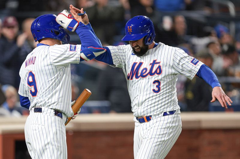 Apr 26, 2024; New York City, New York, USA;  New York Mets catcher Tomas Nido (3) celebrates with left fielder Brandon Nimmo (9) after scoring after his solo home run during the fifth inning against the St. Louis Cardinals at Citi Field. Mandatory Credit: Vincent Carchietta-USA TODAY Sports