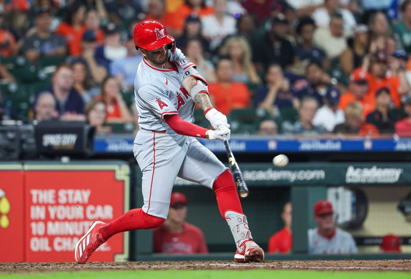 Sep 22, 2024; Houston, Texas, USA; Los Angeles Angels shortstop Zach Neto (9) hits a home run during the eighth inning against the Houston Astros at Minute Maid Park. Mandatory Credit: Troy Taormina-Imagn Images