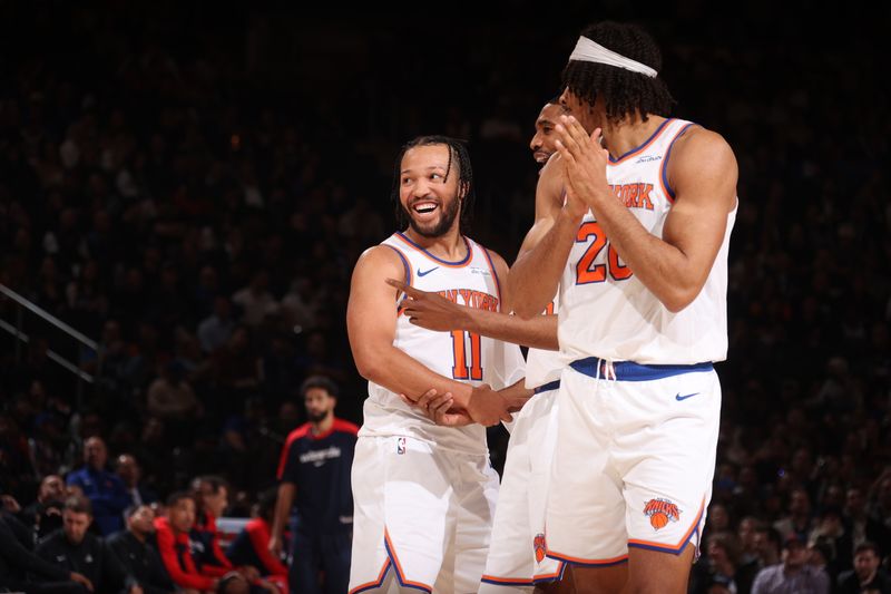 NEW YORK, NY - NOVEMBER 18: Jalen Brunson #11 of the New York Knicks smiles during the game against the Washington Wizards on November 18, 2024 at Madison Square Garden in New York City, New York.  NOTE TO USER: User expressly acknowledges and agrees that, by downloading and or using this photograph, User is consenting to the terms and conditions of the Getty Images License Agreement. Mandatory Copyright Notice: Copyright 2024 NBAE  (Photo by Nathaniel S. Butler/NBAE via Getty Images)