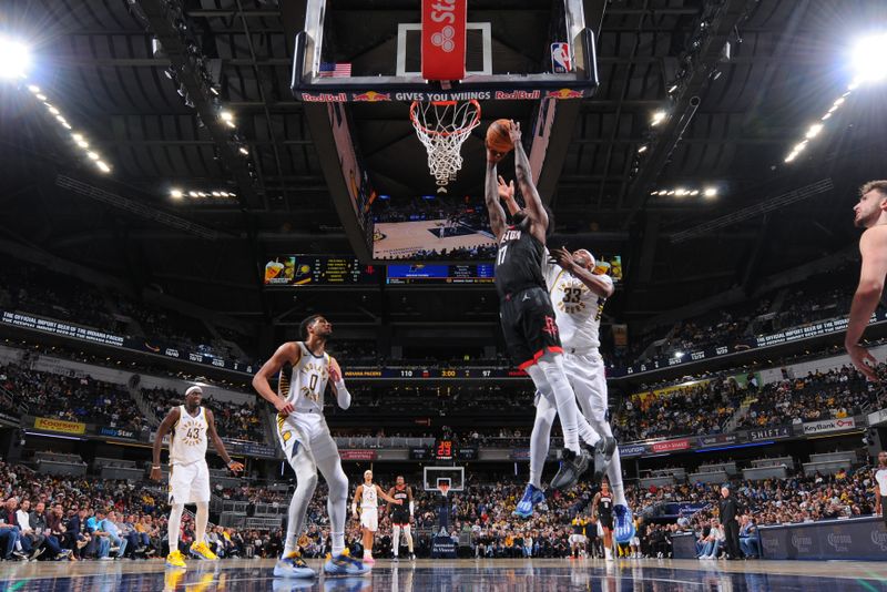 INDIANAPOLIS, IN - MARCH 4: Tari Eason #17 of the Houston Rockets dunks the ball during the game against the Indiana Pacers  on March 4, 2025 at Gainbridge Fieldhouse in Indianapolis, Indiana. NOTE TO USER: User expressly acknowledges and agrees that, by downloading and or using this Photograph, user is consenting to the terms and conditions of the Getty Images License Agreement. Mandatory Copyright Notice: Copyright 2025 NBAE (Photo by Ron Hoskins/NBAE via Getty Images)