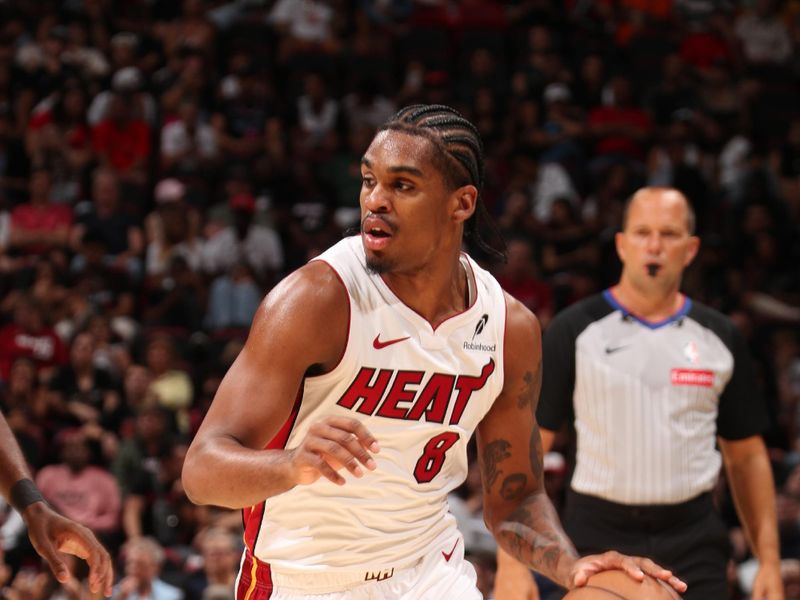 MIAMI, FL - OCTOBER 13: Josh Christopher #8 of the Miami Heat dribbles the ball during the game against the New Orleans Pelicans during a NBA pre season game on October 13, 2024 at Kaseya Center in Miami, Florida. NOTE TO USER: User expressly acknowledges and agrees that, by downloading and or using this Photograph, user is consenting to the terms and conditions of the Getty Images License Agreement. Mandatory Copyright Notice: Copyright 2024 NBAE (Photo by Issac Baldizon/NBAE via Getty Images)