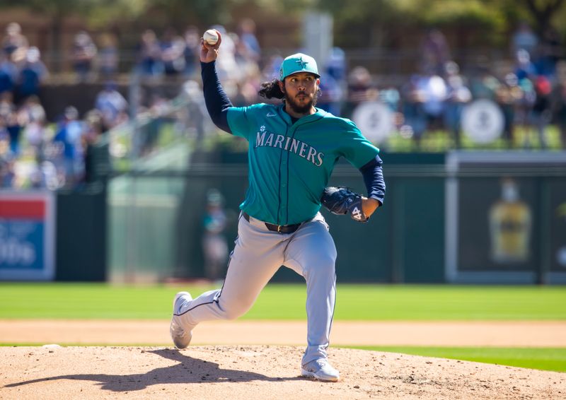 Mar 13, 2024; Phoenix, Arizona, USA; Seattle Mariners pitcher Andres Munoz against the Los Angeles Dodgers during a spring training game at Camelback Ranch-Glendale. Mandatory Credit: Mark J. Rebilas-USA TODAY Sports