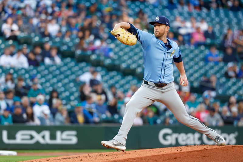 Aug 27, 2024; Seattle, Washington, USA; Tampa Bay Rays starting pitcher Jeffrey Springs (59) throws against the Seattle Mariners during the first inning at T-Mobile Park. Mandatory Credit: Joe Nicholson-USA TODAY Sports