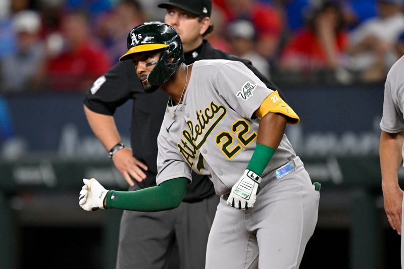 May 1, 2025; Arlington, Texas, USA; Athletics left fielder Miguel Andujar (22) celebrates hitting a single against the Texas Rangers during the eighth inning at Globe Life Field. Mandatory Credit: Jerome Miron-Imagn Images