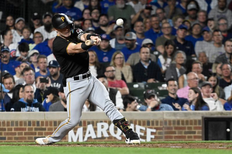 Sep 20, 2023; Chicago, Illinois, USA; Pittsburgh Pirates right fielder Henry Davis (32)  hits a two RBI single against the  Chicago Cubs during the fourth inning  at Wrigley Field. Mandatory Credit: Matt Marton-USA TODAY