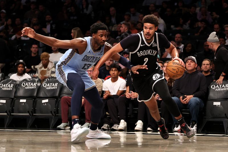 NEW YORK, NEW YORK - NOVEMBER 04: Cameron Johnson #2 of the Brooklyn Nets dribbles the ball as Jaren Jackson Jr. #13 of the Memphis Grizzlies defends during the second half at Barclays Center on November 04, 2024 in the Brooklyn borough of New York City. (Photo by Luke Hales/Getty Images)