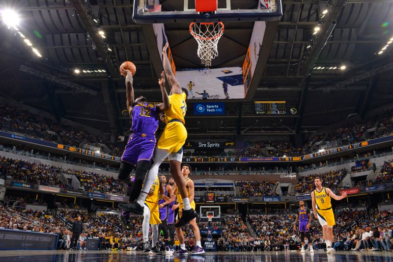 INDIANAPOLIS, IN - MARCH 29: Taurean Prince #12 of the Los Angeles Lakers drives to the basket during the game against the Indiana Pacers on March 24, 2024 at Gainbridge Fieldhouse in Indianapolis, Indiana. NOTE TO USER: User expressly acknowledges and agrees that, by downloading and or using this Photograph, user is consenting to the terms and conditions of the Getty Images License Agreement. Mandatory Copyright Notice: Copyright 2024 NBAE (Photo by Jesse D. Garrabrant /NBAE via Getty Images)