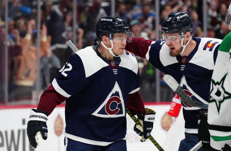 Apr 7, 2024; Denver, Colorado, USA; Colorado Avalanche left wing Artturi Lehkonen (62) celebrates his goal with right wing Valeri Nichushkin (13) in the second period against the Dallas Stars at Ball Arena. Mandatory Credit: Ron Chenoy-USA TODAY Sports