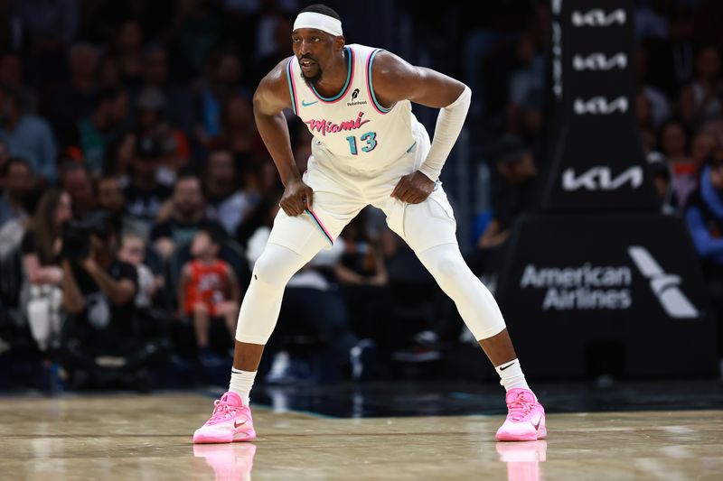 MIAMI, FLORIDA - FEBRUARY 10: Bam Adebayo #13 of the Miami Heat defends against the Boston Celtics during the second half at Kaseya Center on February 10, 2025 in Miami, Florida. NOTE TO USER: User expressly acknowledges and agrees that, by downloading and or using this Photograph, user is consenting to the terms and conditions of the Getty Images License Agreement. (Photo by Carmen Mandato/Getty Images)