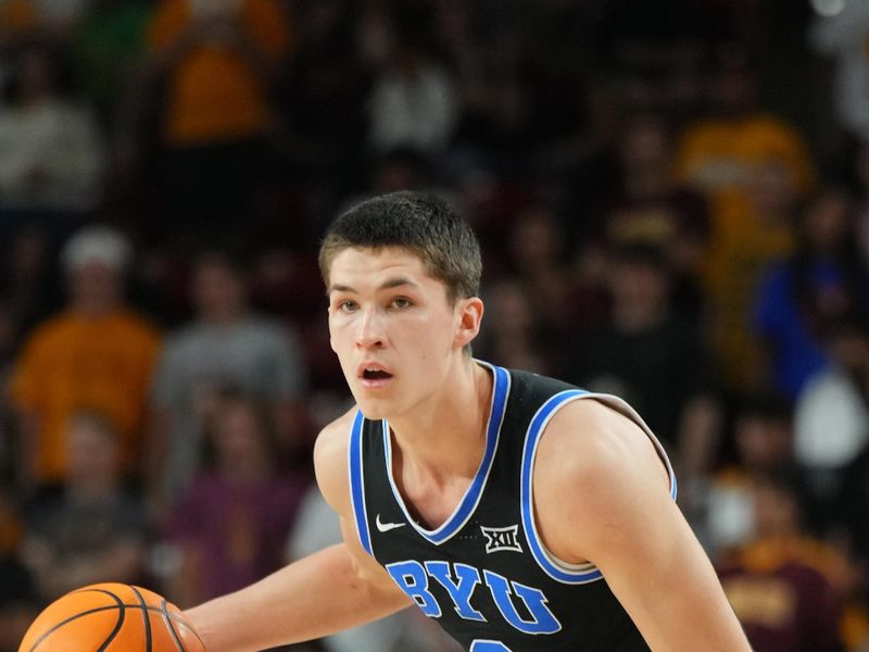 Feb 26, 2025; Tempe, Arizona, USA; Brigham Young Cougars guard Egor Demin (3) controls the ball against the Arizona State Sun Devils at Desert Financial Arena. Mandatory Credit: Joe Camporeale-Imagn Images