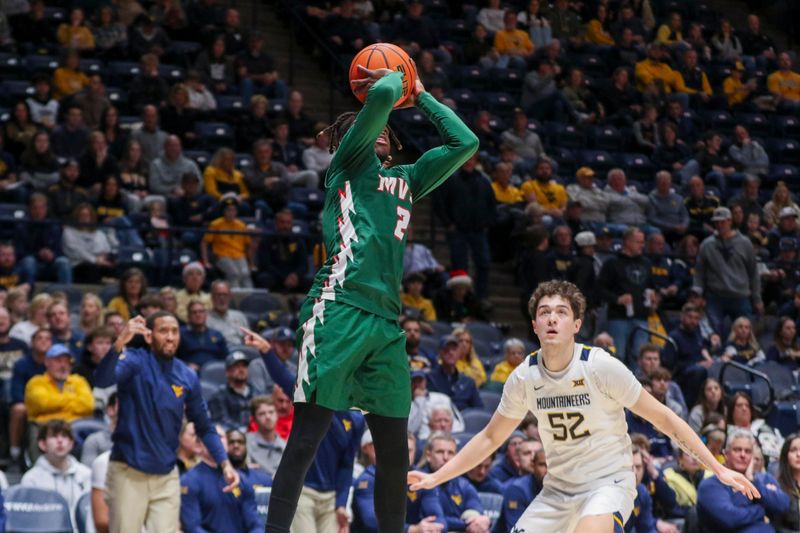 Dec 22, 2025; Morgantown, West Virginia, USA; Mississippi Valley State Delta Devils guard Delkedric Holmes (2) shoots a jumper during the first half against the West Virginia Mountaineers at Hope Coliseum. Mandatory Credit: Ben Queen-Imagn Images