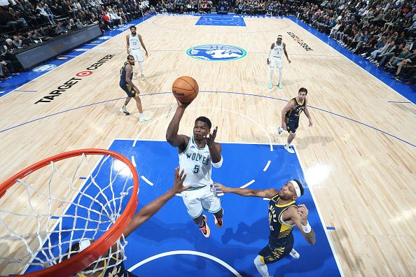 MINNEAPOLIS, MN -  DECEMBER 16: Anthony Edwards #5 of the Minnesota Timberwolves drives to the basket during the game against the Indiana Pacers on December 16 , 2023 at Target Center in Minneapolis, Minnesota. NOTE TO USER: User expressly acknowledges and agrees that, by downloading and or using this Photograph, user is consenting to the terms and conditions of the Getty Images License Agreement. Mandatory Copyright Notice: Copyright 2023 NBAE (Photo by David Sherman/NBAE via Getty Images)