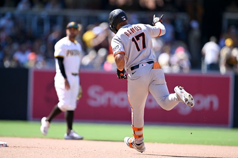Apr 30, 2025; San Diego, California, USA; San Francisco Giants left fielder Heliot Ramos (17) rounds the bases after hitting a solo home run during the seventh inning against the San Diego Padres at Petco Park. Mandatory Credit: Denis Poroy-Imagn Images