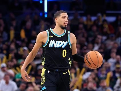 INDIANAPOLIS, INDIANA - DECEMBER 23: Tyrese Haliburton #0 of the Indiana Pacers brings the ball up the court in the game against the Orlando Magic during the second half at Gainbridge Fieldhouse on December 23, 2023 in Indianapolis, Indiana. NOTE TO USER: User expressly acknowledges and agrees that, by downloading and or using this photograph, User is consenting to the terms and conditions of the Getty Images License Agreement. (Photo by Justin Casterline/Getty Images)