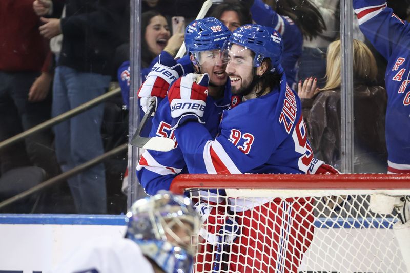 Feb 28, 2025; New York, New York, USA;  New York Rangers left wing Will Cuylle (50) celebrates with center Mika Zibanejad (93) after scoring a goal in the third period against the Toronto Maple Leafs at Madison Square Garden. Mandatory Credit: Wendell Cruz-Imagn Images